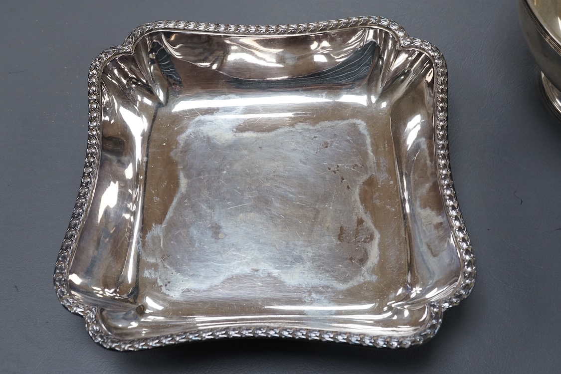 A 20th century Portuguese 833 standard fruit bowl, diameter 20cm, together with an Italian 800 standard two handled dish and a French 950 standard dish, gross 43.2oz.